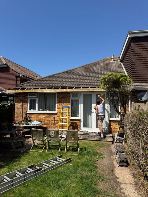 Storm Dry Roofing fascia job: old fascia boards stripped back on a bungalow, ready for new uPVC